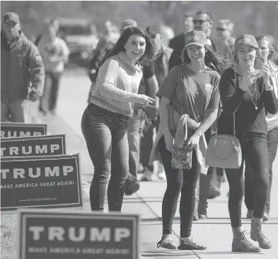  ?? BENJAMIN KRAIN / GETTY IMAGES ?? While Bill Clinton won his home state of Arkansas by a wide margin in the 1990s, the GOP has won the state in recent elections, driven by antagonism against Barack Obama by the primarily white, working-class residents.