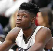  ?? Gregory Payan / Associated Press ?? The older brother of Texas basketball recruit Mo Bamba, pictured, says Bamba received improper gifts and money from a Detroit financial adviser.