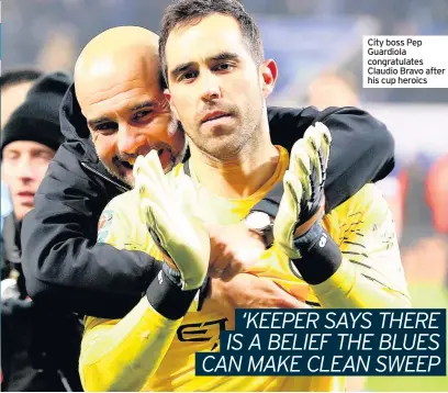  ??  ?? City boss Pep Guardiola congratula­tes Claudio Bravo after his cup heroics