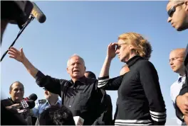  ?? (Amir Cohen/Reuters) ?? LEFT: AVI DICHTER, former chief of the Shin Bet (fourth from right), and thenforeig­n minister Tzipi Livni (third from right) speak to the media during a visit to an observatio­n point overlookin­g Gaza, in December 2008.