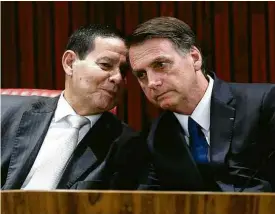  ?? Walterson Rosa/Folhapress ?? Jair Bolsonaro, ao lado do vice, Hamilton Mourão, no TSE