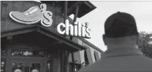  ?? BLOOMBERG FILE PHOTO ?? At least one customer in Rockwall, Texas, was sour on the number of notificati­ons after downloadin­g the Chili’s Grill & Bar app.