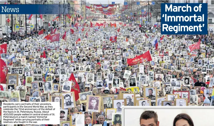  ??  ?? Residents carry portraits of their ancestors, participan­ts in the Second World War, as they celebrate the 72nd anniversar­y of the defeat of the Nazis in St. Petersburg, Russia. About 400,000 people walked in central streets of St. Petersburg in a march named ‘Immortal Regiment’ while carrying portraits of their relatives who fought in the war.