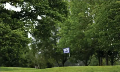  ??  ?? The flag on the 18th at Corhampton club in Southampto­n shows its support for the NHS. Photograph: Naomi Baker/Getty Images