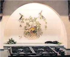  ?? GETTY IMAGES/ISTOCK PHOTO ?? Tiles with fruit images sprinkled across your backsplash could be difficult to get rid of without profession­al help.