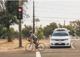  ?? Waymo ?? A Waymo autonomous minivan drives in the area of a former air base in Merced County, where the company has been doing extensive testing.