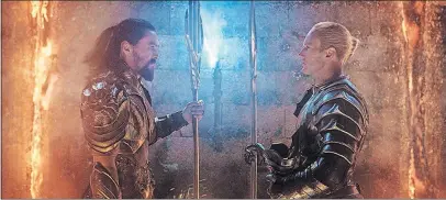  ?? [WARNER BROS. PICTURES] ?? Aquaman (Jason Momoa), left, and King Orm (Patrick Wilson)