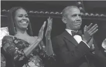  ??  ?? Michelle and Barack Obama applaud during their final Kennedy Center Honors in Washington, D.C., on Sunday night.