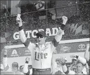  ?? [TERRY RENNA/THE ASSOCIATED PRESS] ?? Brad Keselowski celebrates in victory lane Sunday after winning the NASCAR Clash at Daytona Internatio­nal Speedway in Daytona Beach, Fla.