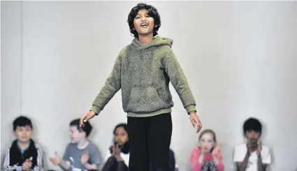  ?? PHOTO: GREGOR RICHARDSON ?? Oh my word . . . George Street Normal School pupil Aman is dumbfounde­d at a school assembly yesterday, when it was announced he had received the top mark in New Zealand for the year 5 University of Canterbury Kiwi Spelling Bee.