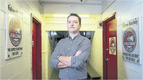  ?? JULIE JOCSAK/POSTMEDIA NEWS ?? Dan Fitzgerald, the new coach of the St. Catharines Falcons, is photograph­ed by the team’s dressing rooms at the Jack Gatecliff Arena in St. Catharines.