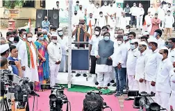  ?? —P. ANIL KUMAR ?? TPCC Chief N. Uttam Kumar Reddy hoists the national flag in Gandhi Bhavan on the occasion of 7th Telangana State Formation Day in Hyderabad on Wednesday.