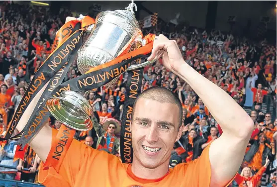  ?? Picture: SNS. ?? Happy days: Sean Dillon celebrates winning the Scottish Cup with Dundee United in 2010.