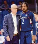  ?? Justin Casterline/Getty Images ?? Dan Hurley, left, and Tristen Newton have strong chances of winning Big East men's basketball Coach of the Year and Player of the Year awards, respective­ly.