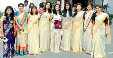  ??  ?? A group of students celebrate at the 20th convocatio­n of the University of Hyderabad on Monday.