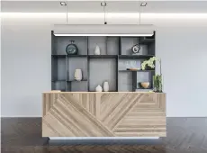  ??  ?? Range reception desk by Union Wood Co. makes strong first impression.