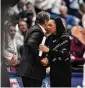  ?? Jessica Hill / Associated Press ?? UConn coach Geno Auriemma, left, and South Carolina coach Dawn Staley shake hands at the end of a 2019 game in Hartford.