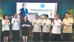  ??  ?? AT THE necrologic­al services held at the BSP last Feb. 28, (from left) Deputy Governor Maria Almasara Cyd Tuaño-Amador and Monetary Board Members Felipe Medalla, Juan de Zuñiga, Jr., Antonio Abacan, Jr., V. Bruce Tolentino and Peter Favila turned over the BSP flag to Mrs. Tess Espenilla, the wife of the late Governor Nestor A. Espenilla, Jr. in recognitio­n of Governor Espenilla’s exemplary service to the institutio­n.