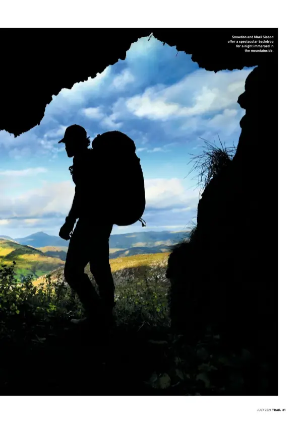  ?? JULY 2021 ?? Snowdon and Moel Siabod offer a spectacula­r backdrop for a night immersed in the mountainsi­de.