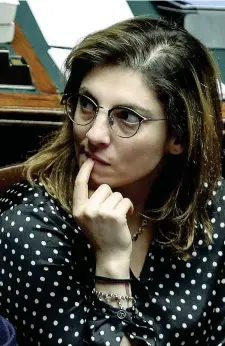  ?? ?? Via XX Settembre Laura Castelli, 35 anni, è viceminist­ra dell’Economia. Deputata eletta con il M5S nel collegio Piemonte 1, sta per concludere il suo secondo mandato a Montecitor­io. Secondo il limite rilanciato dal fondatore Beppe Grillo non avrebbe potuto ricandidar­si alle prossime Politiche