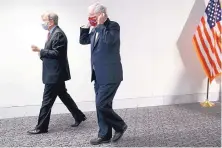  ?? JACQUELYN MARTIN/ASSOCIATED PRESS ?? Sen. Roy Blunt, R-Mo., left, and Senate Majority Leader Mitch McConnell leave a news conference after a Republican luncheon Tuesday on Capitol Hill in Washington.