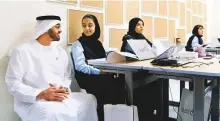  ?? Gulf News Archives ?? Shaikh Mohammad interacts with students during a visit ■ to Al Asayel Primary School while he was Crown Prince.