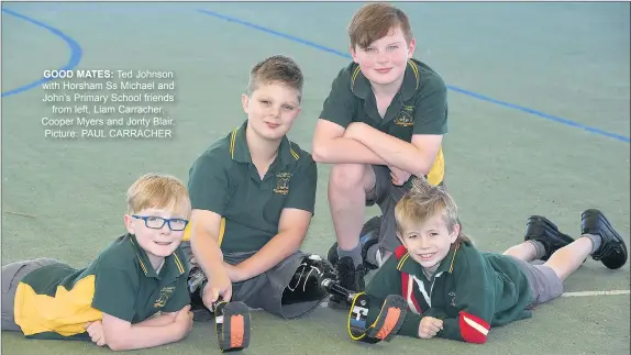  ?? Picture: PAUL CARRACHER ?? GOOD MATES: Ted Johnson with Horsham Ss Michael and John’s Primary School friends from left, Liam Carracher, Cooper Myers and Jonty Blair.