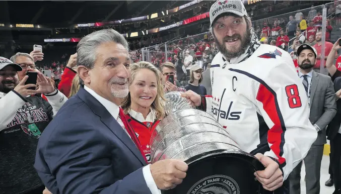  ?? BRUCE BENNETT / GETTY IMAGES FILES ?? Washington Capitals owner Ted Leonsis holds the big prize along with Alex Ovechkin after winning the 2018 Stanley Cup. “I liken sports betting more to Wall Street ... I don’t believe it’ll be considered a game of chance,” says Leonsis, who owns seven pro sports teams.