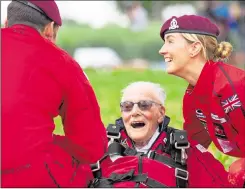  ?? Pictures: Richard Watt, Cpl Jamie Hart ?? Jock Hutton taking part in D-Day commemorat­ions in 2019 as he comes in safely to land