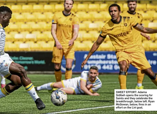  ?? ?? SWEET EFFORT: Adama Sidibeh opens the scoring for Saints and they celebrate the breakthrou­gh, below left. Ryan Mcgowan, below, fires in an effort on the Livi goal.