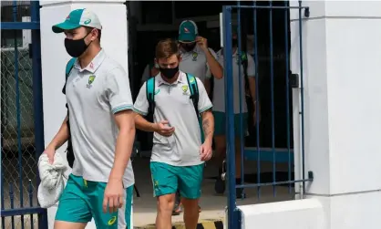  ?? Photograph: Randy Brooks/AFP/Getty Images ?? Australia players leave the abandoned second ODI at Kensington Oval in Barbados following a positive Covid case in the West Indies camp.