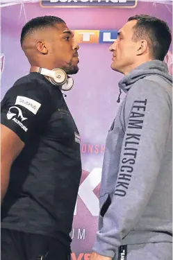  ?? Picture: Getty Images. ?? Anthony Joshua and Wladimir Klitschko at yesterday’s press conference. The pair will meet again tomorrow with the world heavyweigh­t title at stake.