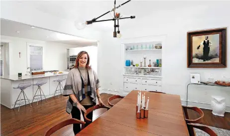  ?? [PHOTO BY JIM BECKEL, THE OKLAHOMAN] ?? Jennifer Arsenault, 2018 president of the Oklahoma City Metro Associatio­n of Realtors, shows a home she has listed for sale for $565,000 at 812 NW 19.