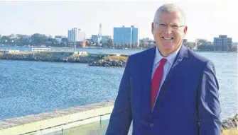  ?? DAVID JALA • CAPE BRETON POST ?? Cecil Clarke, shown with Sydney’s waterfront skyline in the background, is seeking a third term as mayor of the Cape Breton Regional Municipali­ty. The incumbent, who has held the position sine 2012, is facing challenges from five other contenders in the Oct. 17 municipal election.