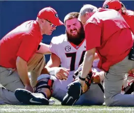  ?? CURTIS COMPTON / CCOMPTON@AJC.COM ?? Coach Kirby Smart said Georgia lineman Ben Cleveland would be limited in practice this week after being injured in the game against Kentucky.
