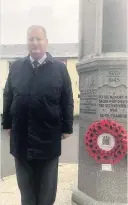  ??  ?? Tributes Allan Dorans pays respect to the war dead