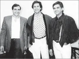  ?? Los Angeles Times ?? ARMAND, left, Georges and Maurice Marciano in 1988. With their borther Paul, not pictured, they founded Guess Inc. in Los Angeles seven years earlier.