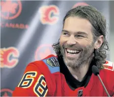  ?? LARRY MACDOUGAL/THE CANADIAN PRESS ?? Jaromir Jagr laughs after being introduced as the newest Calgary Flame at a news conference in Calgary on Wednesday.