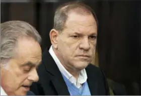  ?? STEVEN HIRSCH/NEW YORK POST VIA AP, POOL ?? Harvey Weinstein, right, stands with his attorney, Benjamin Brafman, during a court proceeding in New York on Friday.