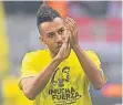  ?? FOTOS: DPA ?? Pierre-Emerick Aubameyang mit Bartra-T-Shirt („Viel Kraft“).