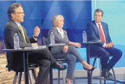  ?? GREG SORBER/JOURNAL ?? Democratic gubernator­ial candidates Jeff Apodaca, left, Michelle Lujan Grisham and Joseph Cervantes debate in the KOAT studios Sunday night.