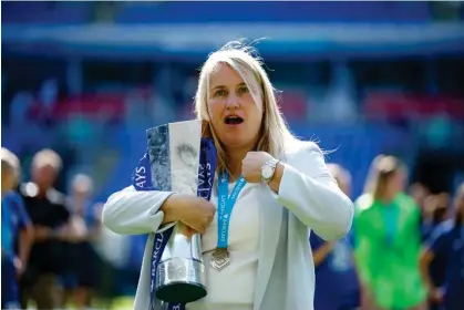  ?? Photograph: John Sibley/Action Images/Reuters ?? Chelsea manager Emma Hayes celebrates with the WSL trophy.