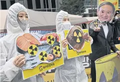  ?? AFP ?? South Korean environmen­tal activists protest Japan’s decision to Fukushima wastewater, near the Japanese embassy in Seoul yesterday.