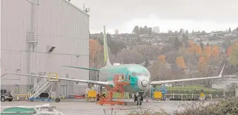  ?? TED S. WARREN/AP ?? A Boeing 737-MAX 8 outside Boeing Co.’s 737 assembly facility in Renton, Wash., on Nov. 14.