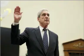  ?? ANDREW HARNIK — THE ASSOCIATED PRESS ?? Former special counsel Robert Mueller, is sworn in before he testifies before the House Judiciary Committee hearing on his report on Russian election interferen­ce, on Capitol Hill, in Washington, Wednesday.