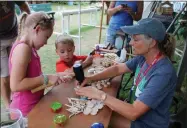  ?? LAUREN HALLIGAN - MEDIANEWS GROUP ?? Carly and Chase Winne of Albany County make a craft at the 2019 Saratoga County Fair.