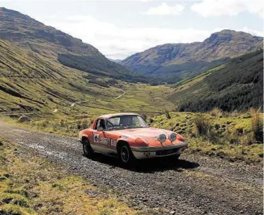  ??  ?? The winning Lotus Elan on the Rest and Be Thankful driven by Graham Walker and Sean Toohey.