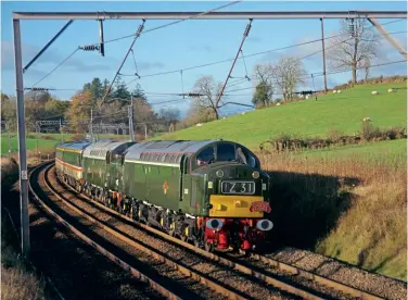  ?? Paul Berry ?? Main line-registered Class 40s D345 and D213 Andania approach Grayrigg summit on the West Coast Main Line, working ‘The Double Scotch’ charter from Crewe to Edinburgh on November 13, 2021. This was the last train to be operated by D345 while on hire to Locomotive Services.