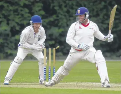  ?? Picture: Chris Davey FM4446901 ?? Canterbury wicketkeep­er Sam Burt attempts to stump HSBC’S Harry Freeman but the batsman had his foot back in time