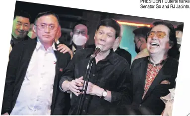  ?? ?? PRESIDENT Duterte flanked by Senator Go and RJ Jacinto.